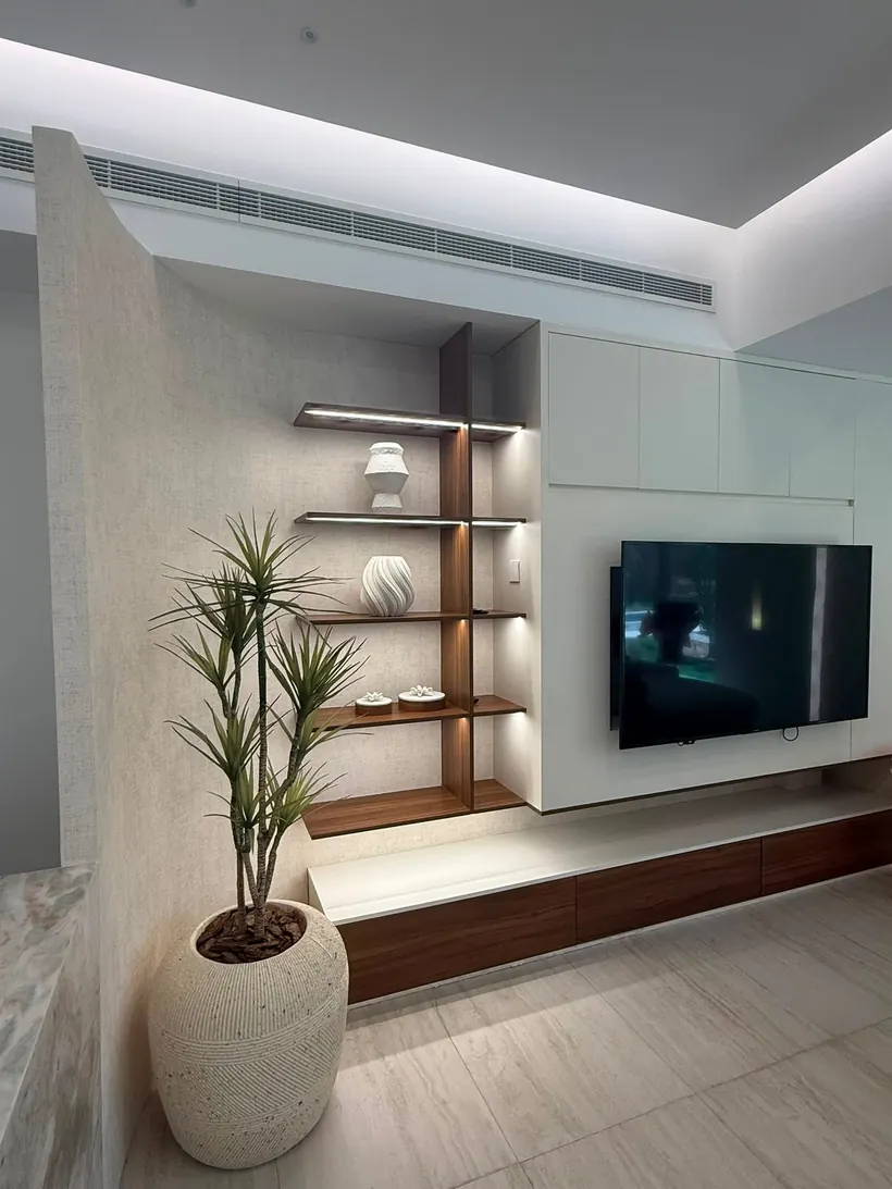 Installed TV unit with floating shelves